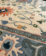 Laura floral Hand tufted rug.