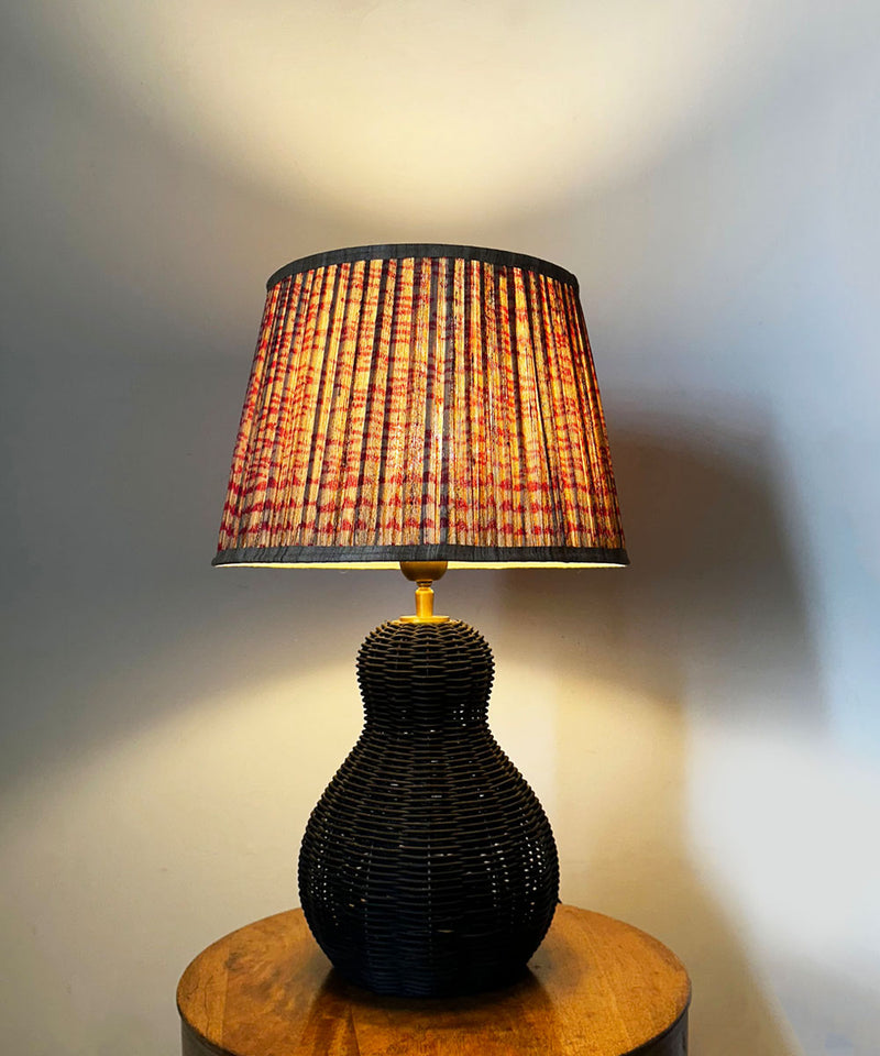 Black Wicker Table Lamp with Pleated Red Print Shade
