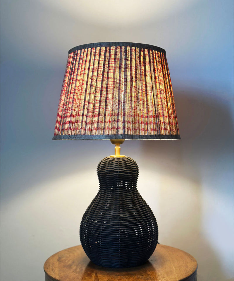 Black Wicker Table Lamp with Pleated Red Print Shade