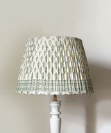 White Wooden Table Lamp with Green Floral Pleated Shade