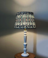 White Wooden Table Lamp with Ikat Pleated Shade