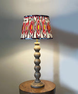 Natural Wood Table Lamp with Red Ikat Pleated Shade
