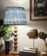 Natural Wood Table Lamp with Blue Ikat Pleated Shade