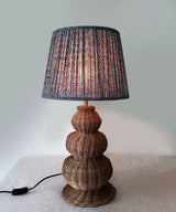 Handwoven Rattan Table Lamp with Pleated Blue Floral Shade