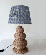 Handwoven Rattan Table Lamp with Pleated Blue Floral Shade